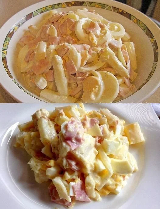 Aspergesalade met gekookte ham en eieren in een elegante presentatie.