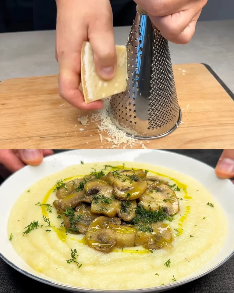 Geroosterde bloemkool en aardappelen met Parmezaan op een bord.