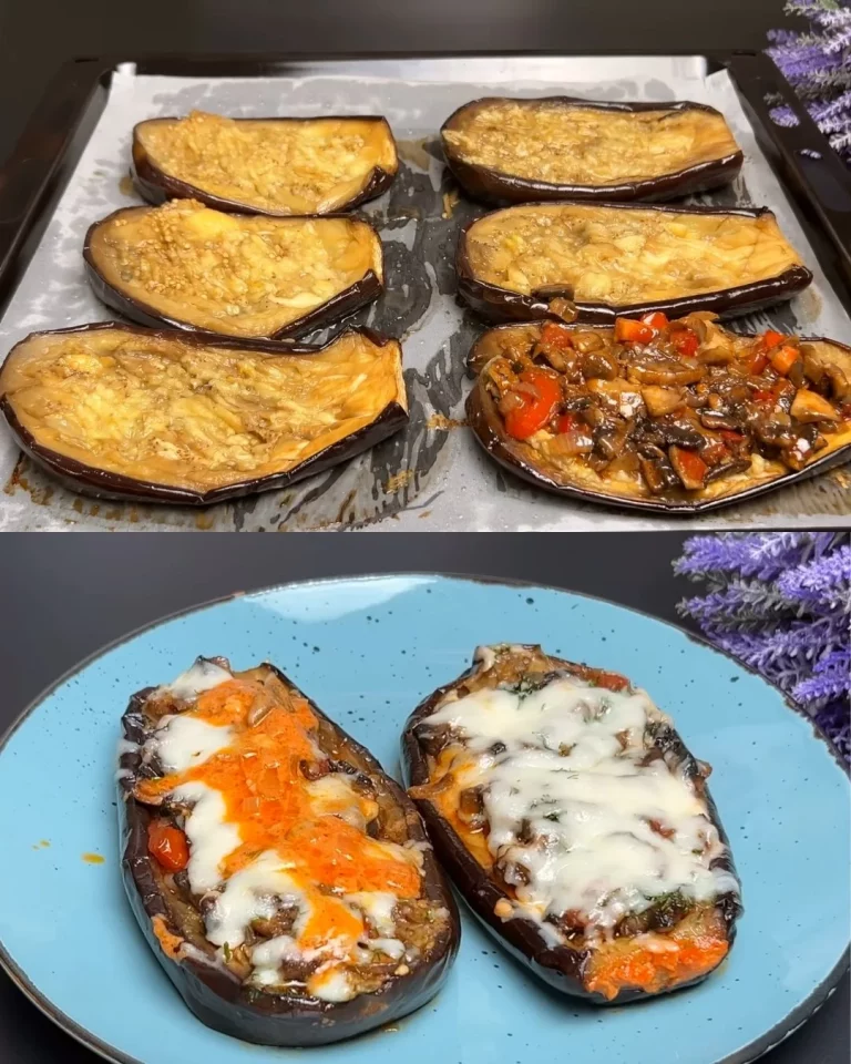 Gevulde aubergine met champignon en tomatenroomsaus op een bord