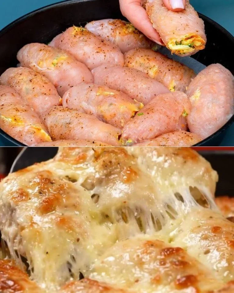 Gevulde kiprolls met coleslaw geserveerd op een bord.