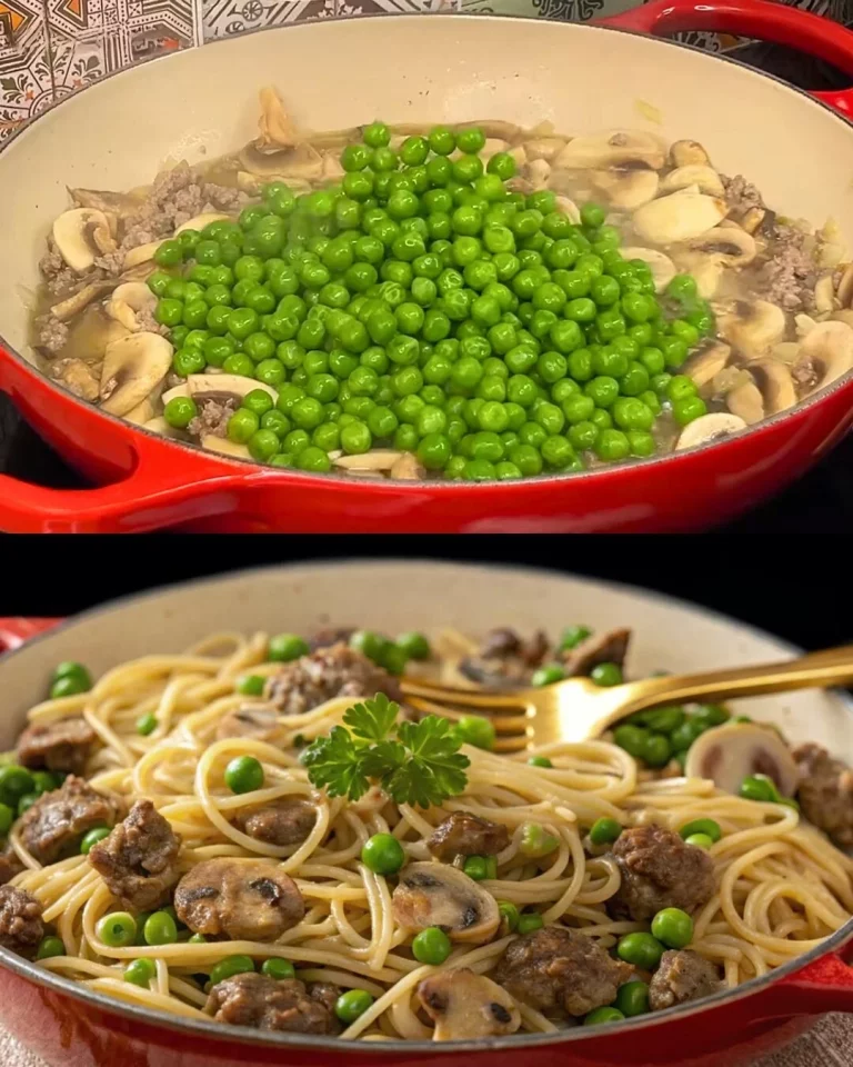 Romige beef spaghetti met champignons en groene erwten op een bord