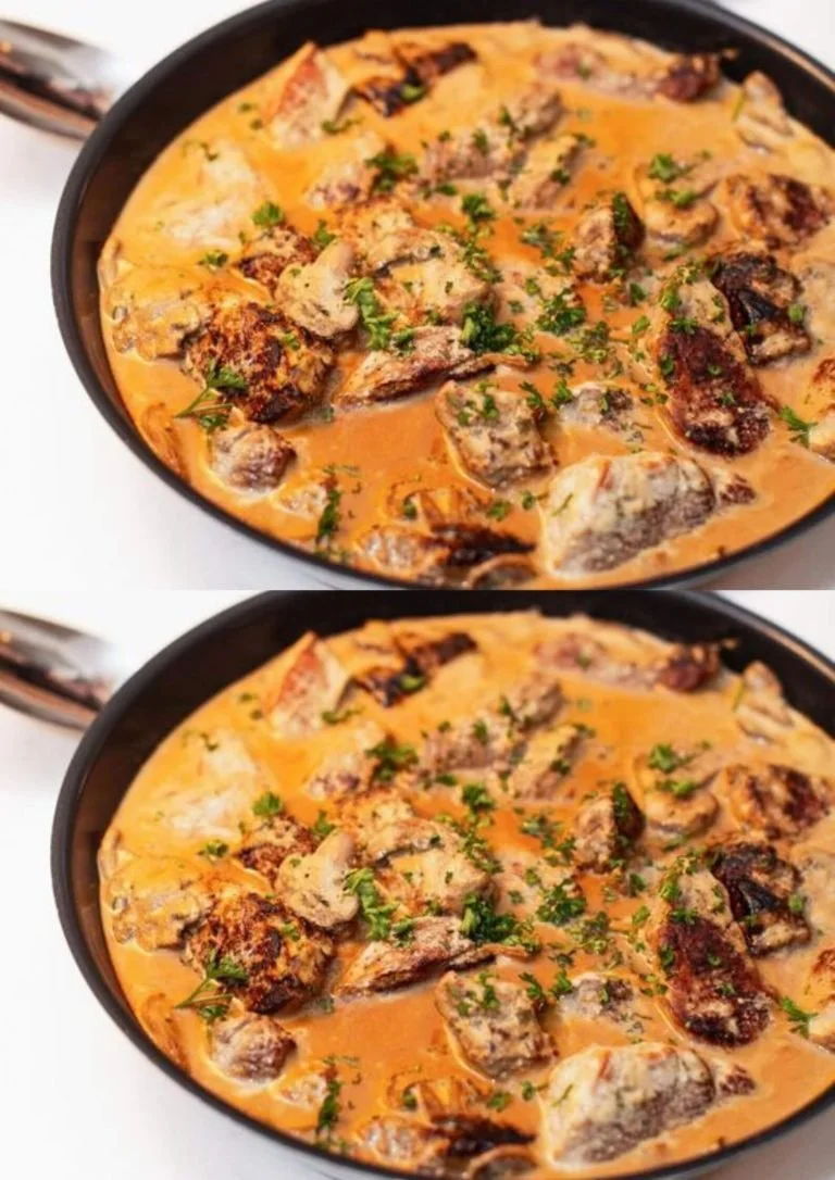 Varkensfilet in tarragon mosterdsaus met groenten op een bord
