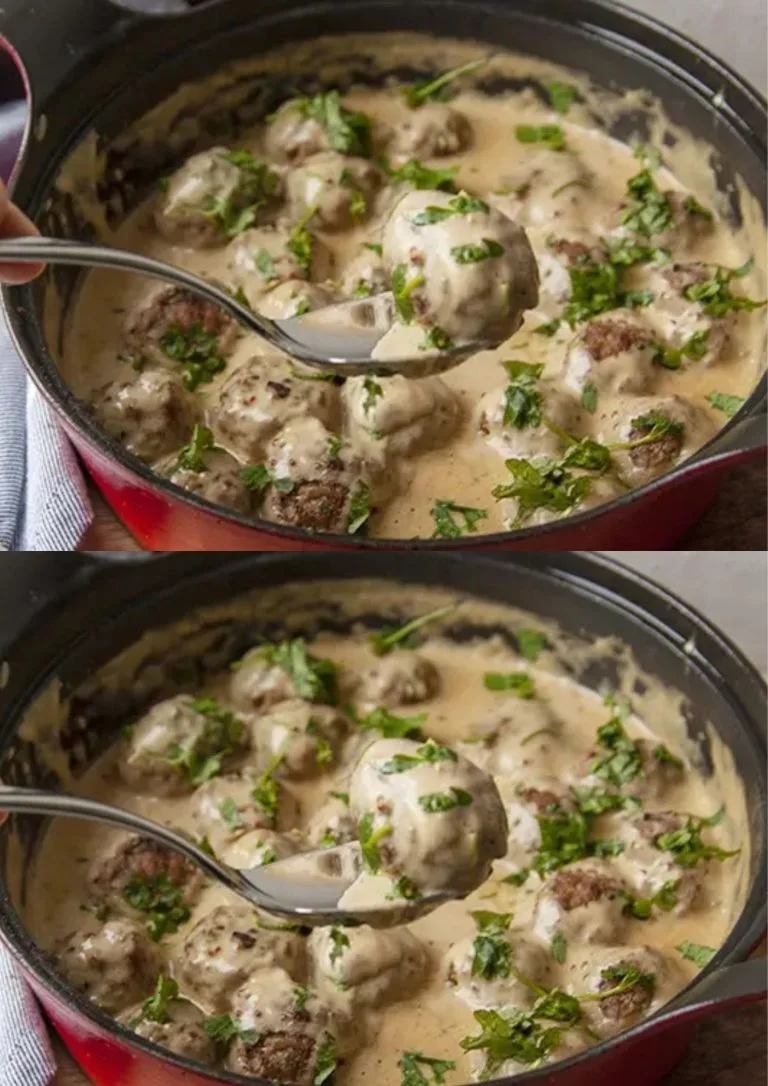 Zweedse gehaktballetjes met romige saus op een bord
