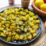 Heerlijke Marokkaanse Specerij Aardappelen met Ui, kleurrijk en smaakvol gerecht.