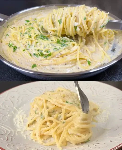 Romige knoflook parmesan spaghetti met verse kruiden en kaas