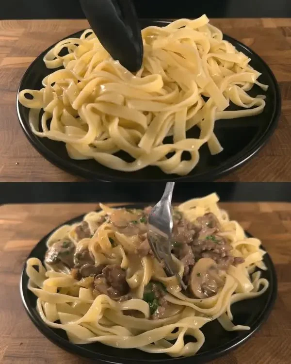 Romige pasta met gehakt en champignons in een kom
