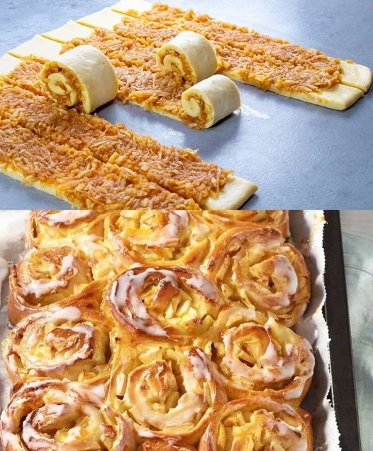 Saftige Apfelschnecken frisch gebacken auf einem Holzbrett